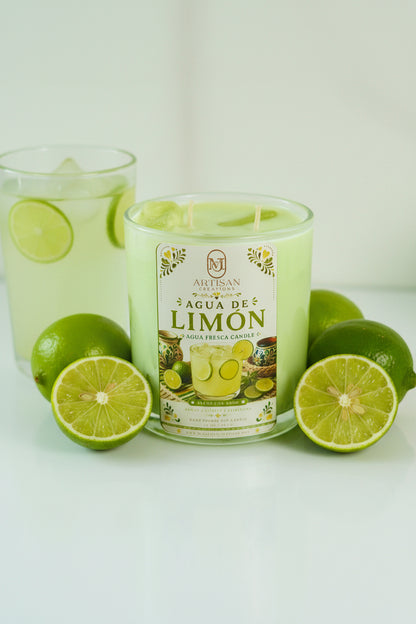 Green candle labeled 'Agua de Limon' on a white background